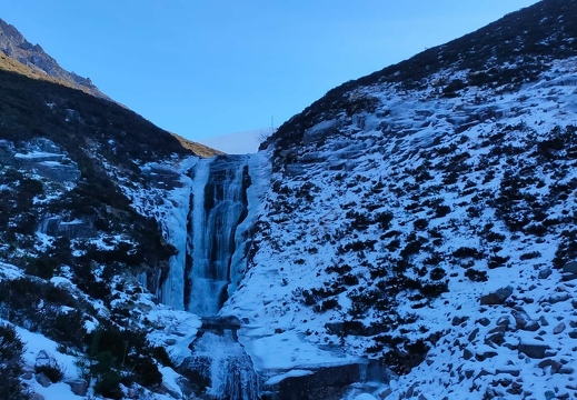 Semi-frozen waterfall between lowe and upper Coire Garbhlach