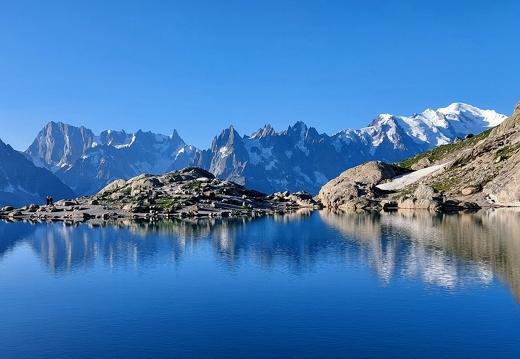 Lac Blanc view across to Grandes Jorasses, Rochefort Ridge, Dent du Geant, Aiguilles de Chamonix and Mont Blanc
