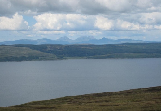 View over the water across the Mull to the paps of Jura
