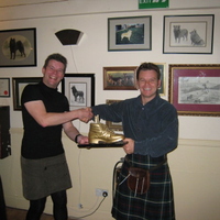 Handing the Golden Boot over to Scott