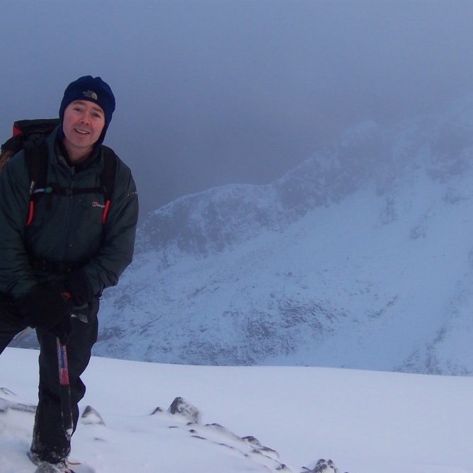 Stuart with the ridge of Sron na Lairig behind.