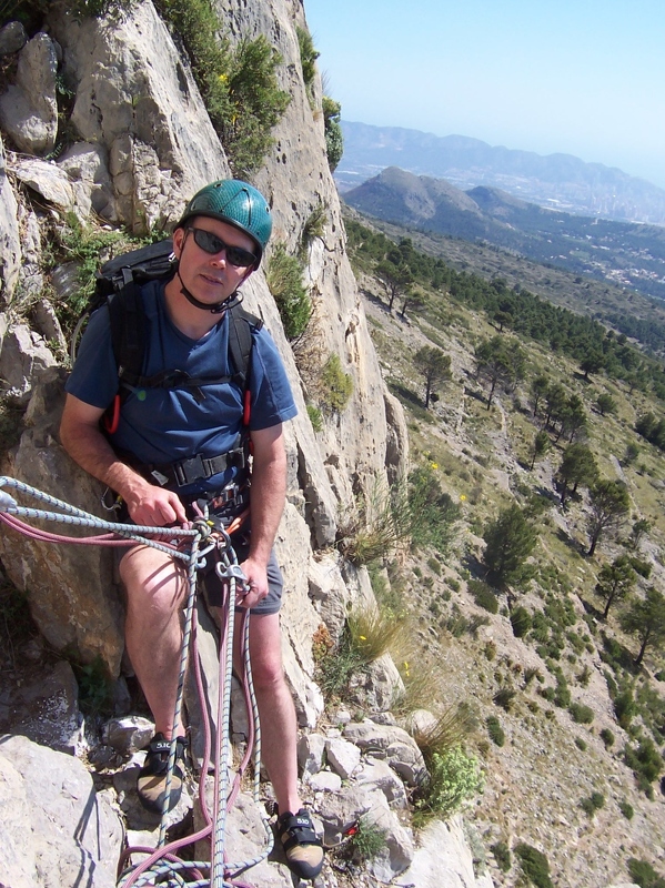 Stuart on belay at start of 3rd pitch of Espolon Central Directa.JPG