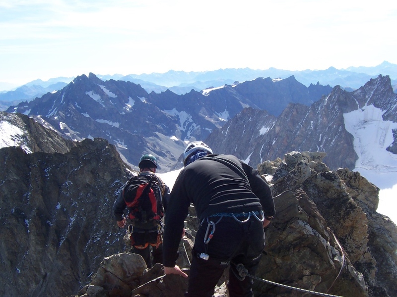 Roche Faurio - Heading back down summit ridge_ des Agneaux at back left.JPG