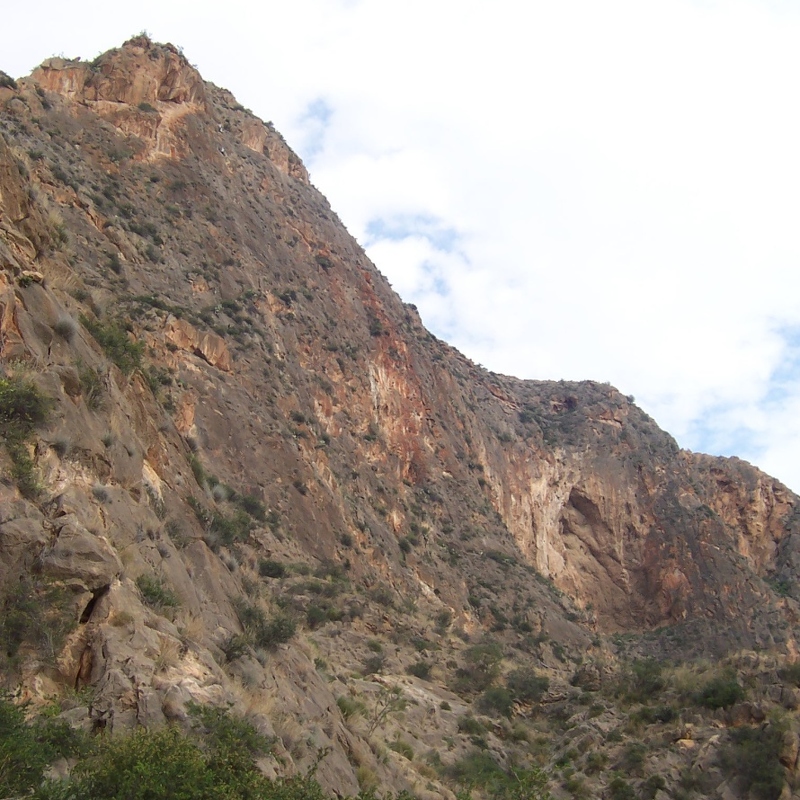 Orihuela - Looking towards Cueva Ahumada with climbers visible high up on La Cantera