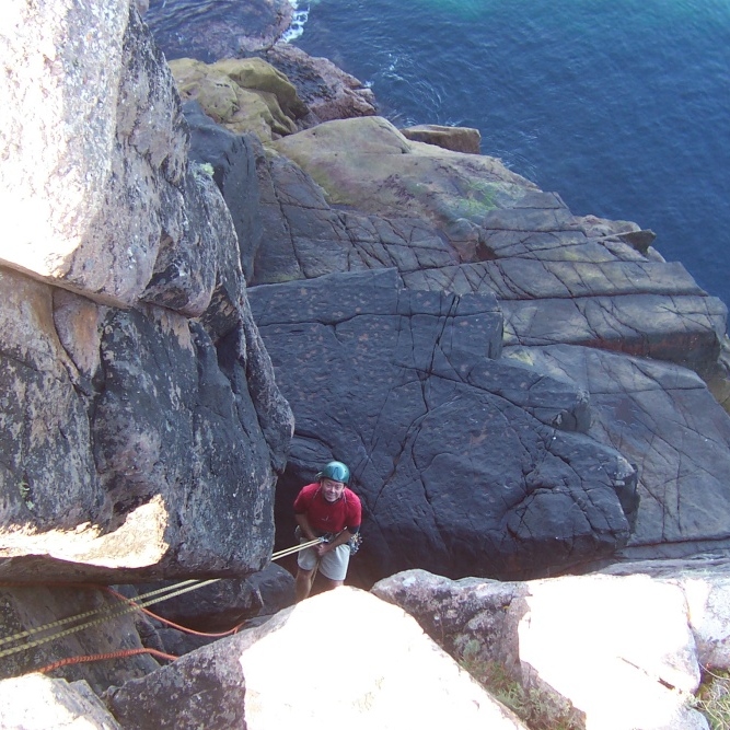 Abseil down the Groove at Black Rocks