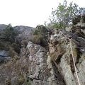 Fidelity - Stuart on the upper slab, other climbers on Damnation