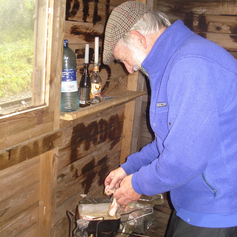 Jim preparing the bacon butties