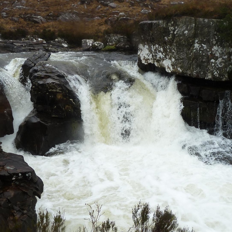 Spectacular waterfalls running into Loch Maree