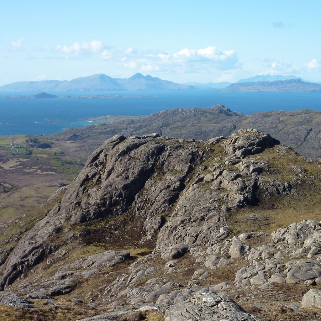 Looking back from the summit over the north top to Hebridean Isles