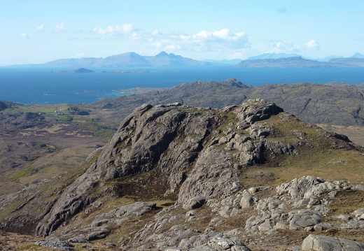 Looking back from the summit over the north top to Hebridean Isles