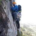 Stuart climbing the 3rd pitch of Via Gene, not warm out of the sun!