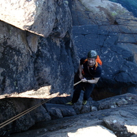 Rod abseiling into the Grooves, Reiff