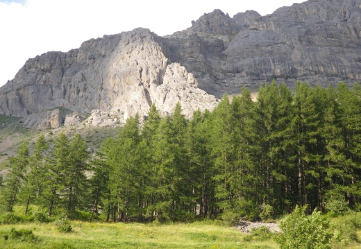 A view up to the crags at Chemin du Roy - Routes in the sunlight