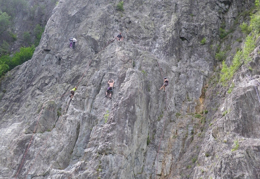 A busy crag, Jeanie on another rappel