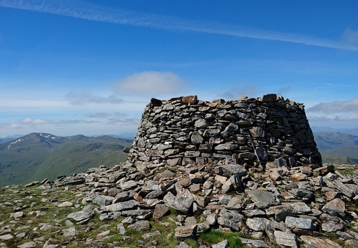 The simply massive cairn on Mam Sodhail! (1181M) Sgurr nan Ceathramhnan with the snow