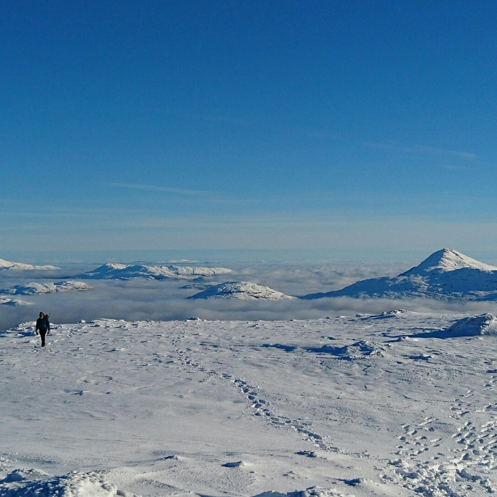 Walker approaching summit Beinn Narnain