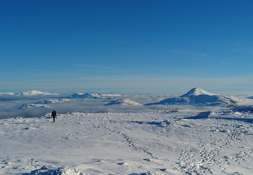 Walker approaching summit Beinn Narnain