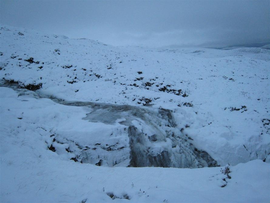 Frozen stream coming off Chno Dearg
