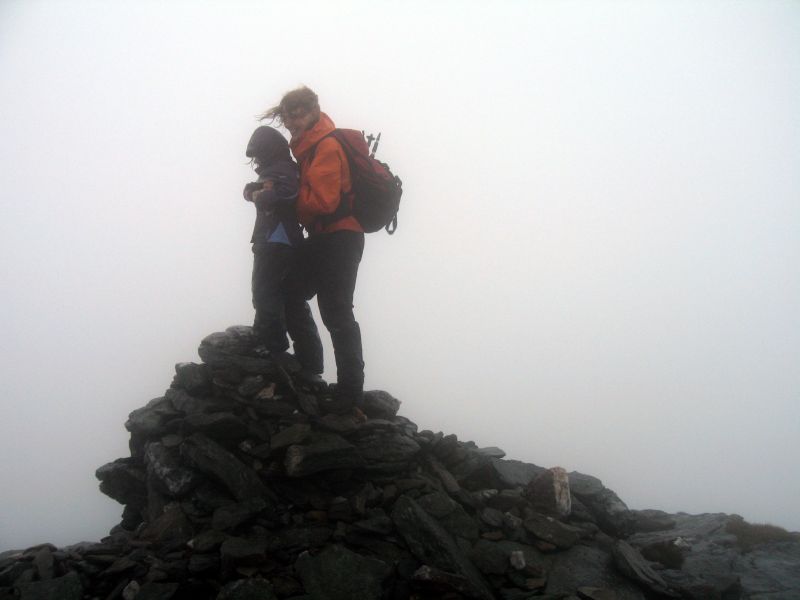 Jean on the final summit of her Munro round, and Cody on her first 