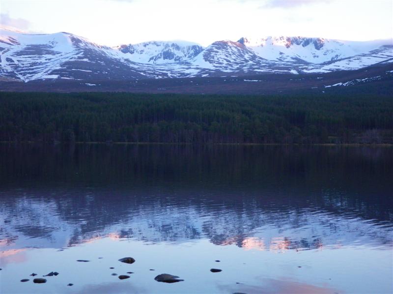 Early evening view across Loch Morlich to the Northern Corries